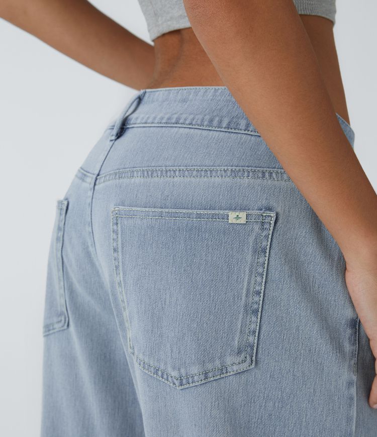 jean décontracté halara flex asymétrique taille basse avec poches zippées et jambes larges délavées