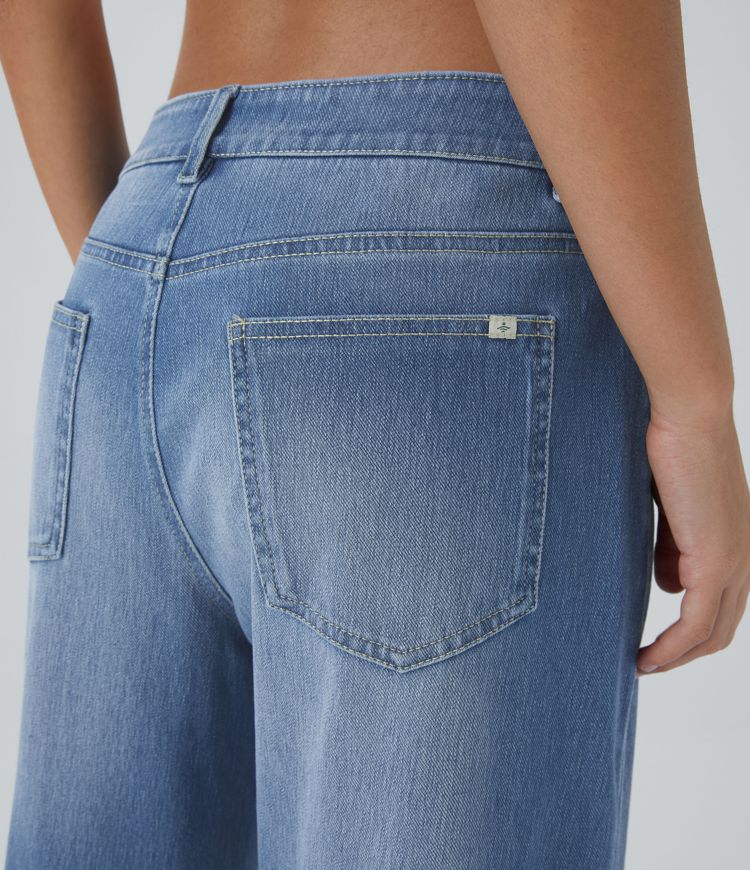 jean décontracté halara flex taille basse avec poches zippées coupe ample et jambes larges.