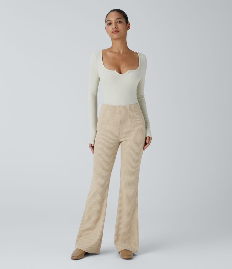 pantalon évasé décontracté en maille côtelée taille haute et poches latérales zippées