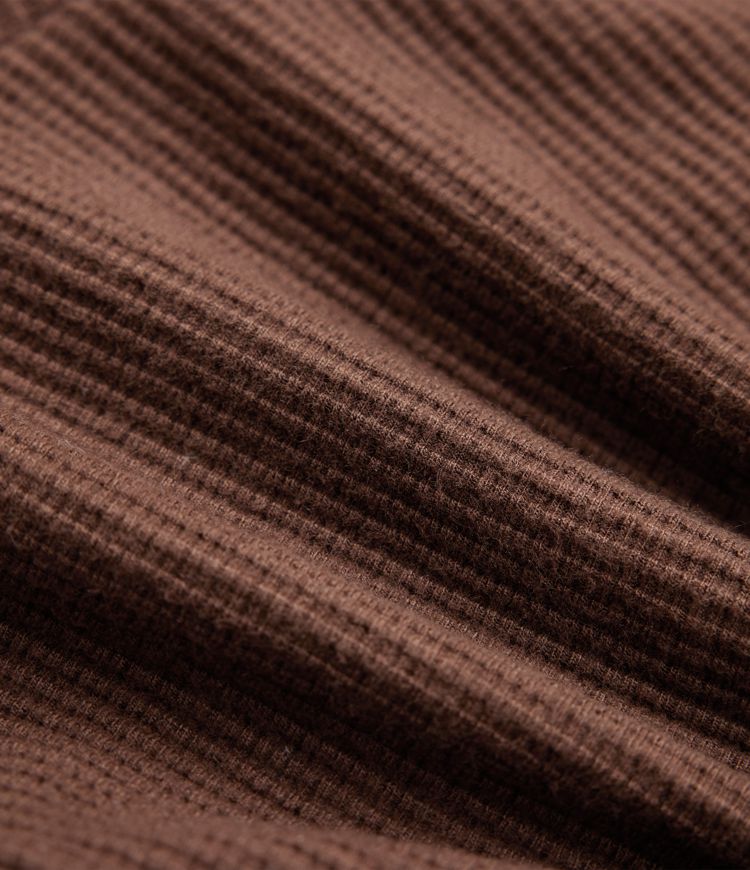 short décontracté à taille haute et poches en tissu gaufré
