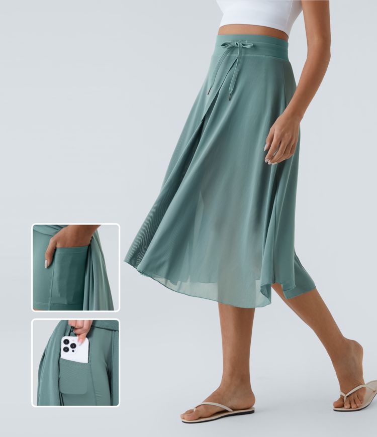 jupe midi évasée fluide et décontractée taille haute cordon de serrage empiècement contrastant en maille poches et poches.