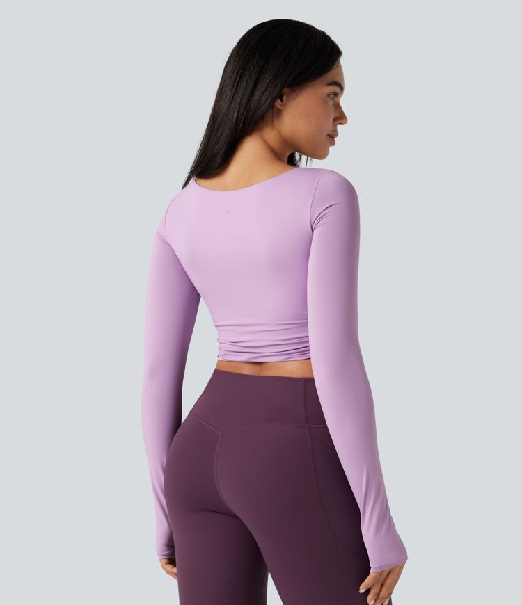 haut de yoga court et croisé push-up moulé et à encolure ronde manches longues et passe-pouces