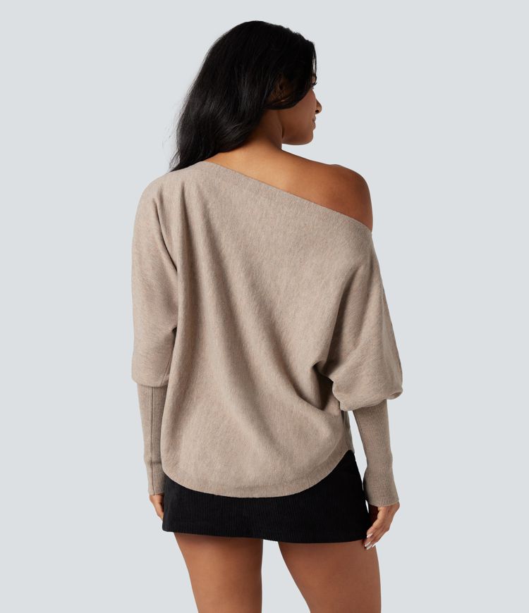 pull de travail asymétrique à manches chauve-souris et ourlet arrondi