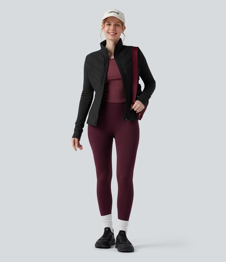 veste de course matelassée à col montant fermeture éclair et manches longues avec poches